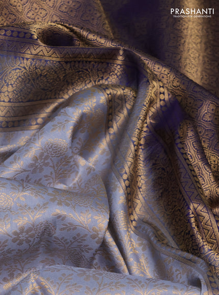 Pure kanchipuram silk saree grey and navy blue with allover zari woven brocade weaves and rich zari woven korvai border