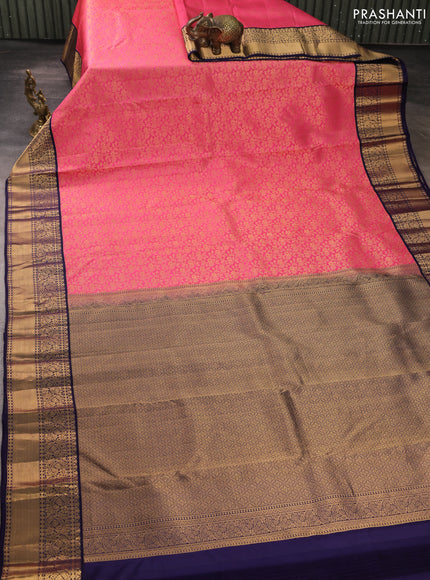 Pure kanchipuram silk saree pink and dark blue with allover zari woven brocade weaves and rich zari woven korvai border