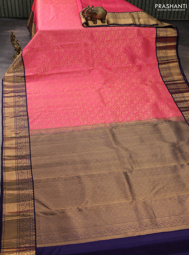 Pure kanchipuram silk saree pink and dark blue with allover zari woven brocade weaves and rich zari woven korvai border