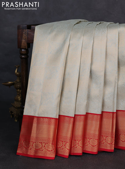 Pure kanchipuram silk saree pastel blue shade and red with allover zari woven brocade weaves and rich zari woven korvai border