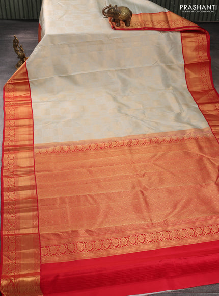 Pure kanchipuram silk saree pastel blue shade and red with allover zari woven brocade weaves and rich zari woven korvai border