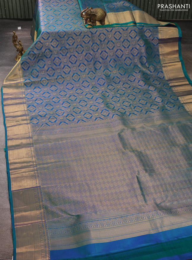 Pure kanchipuram silk saree dual shade of peacock green with allover zari woven brocade weaves and rich zari woven border