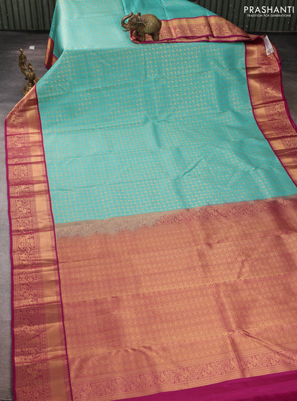 Pure kanchipuram silk saree teal blue and magenta pink with allover zari woven brocade weaves and rich zari woven korvai border