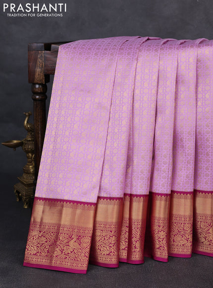 Pure kanchipuram silk saree lavender and magenta pink with allover zari woven brocade weaves and rich zari woven korvai border