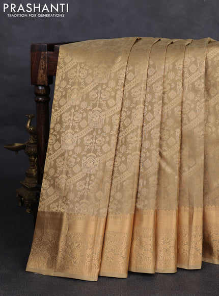 Pure kanchipuram silk saree beige with allover zari woven brocade weaves and rich zari woven border