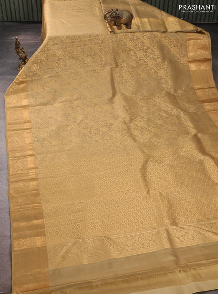 Pure kanchipuram silk saree beige with allover zari woven brocade weaves and rich zari woven border