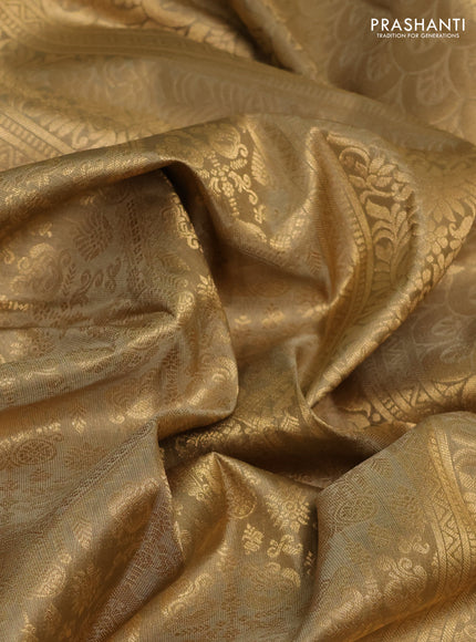 Pure kanchipuram silk saree beige with allover zari woven brocade weaves and rich zari woven border