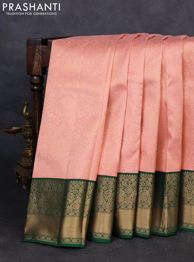 Pure kanchipuram silk saree peach and green with allover zari woven brocade weaves and rich zari woven korvai border