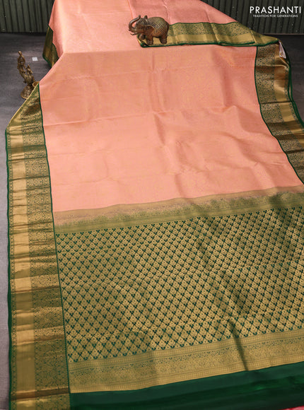 Pure kanchipuram silk saree peach and green with allover zari woven brocade weaves and rich zari woven korvai border