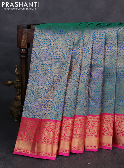 Pure kanchipuram silk saree dual shade of bluish green and pink with allover zari woven brocade weaves and rich zari woven korvai border