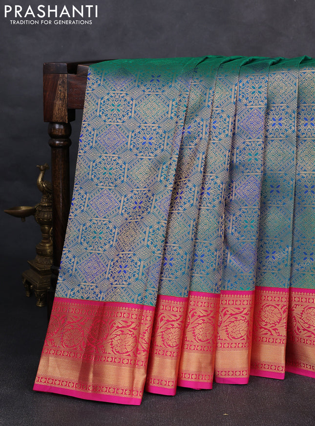 Pure kanchipuram silk saree dual shade of bluish green and pink with allover zari woven brocade weaves and rich zari woven korvai border