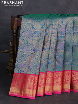 Pure kanchipuram silk saree dual shade of bluish green and pink with allover zari woven brocade weaves and rich zari woven korvai border