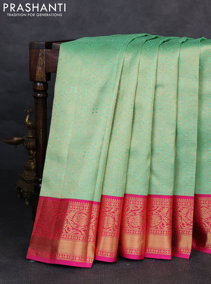 Pure kanchipuram silk saree teal green and pink with allover zari woven brocade weaves and rich floral zari woven korvai border