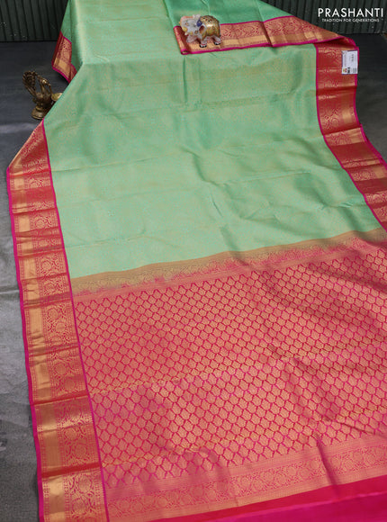 Pure kanchipuram silk saree teal green and pink with allover zari woven brocade weaves and rich floral zari woven korvai border