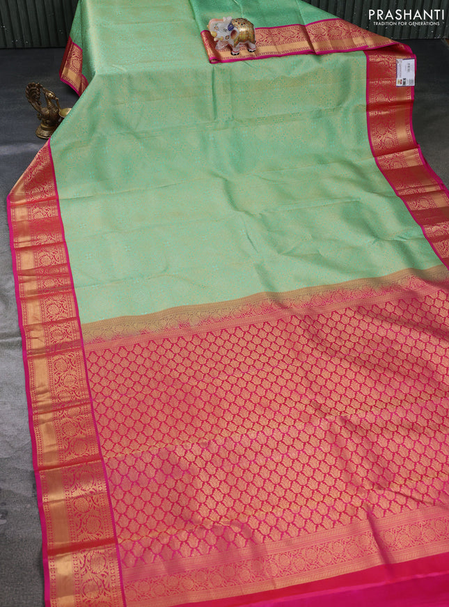 Pure kanchipuram silk saree teal green and pink with allover zari woven brocade weaves and rich floral zari woven korvai border