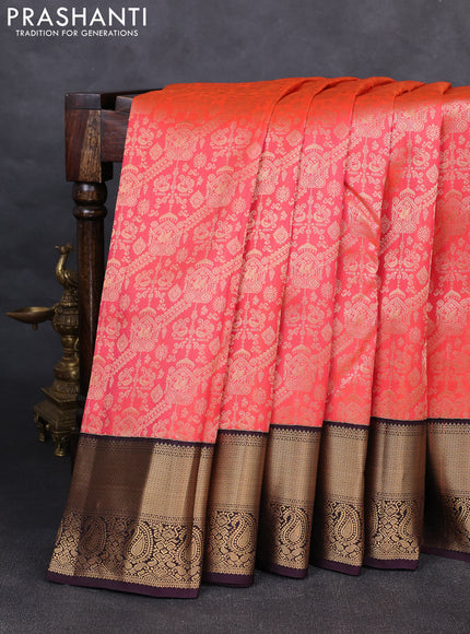Pure kanchipuram silk saree peach orange and deep wine with allover zari woven brocade weaves and rich zari woven paisley korvai border