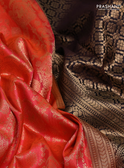 Pure kanchipuram silk saree peach orange and deep wine with allover zari woven brocade weaves and rich zari woven paisley korvai border