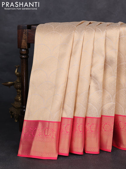 Pure kanchipuram silk saree cream and peach pink with allover zari woven brocade weaves and rich zari woven korvai border