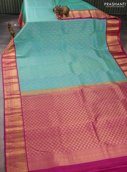 Pure kanchipuram silk saree teal blue and magenta pink with allover zari woven brocade weaves and rich zari woven korvai border