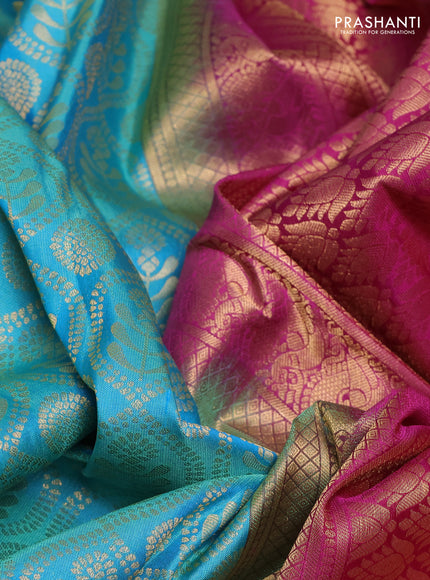 Pure kanchipuram silk saree teal blue and magenta pink with allover zari woven brocade weaves and rich zari woven korvai border
