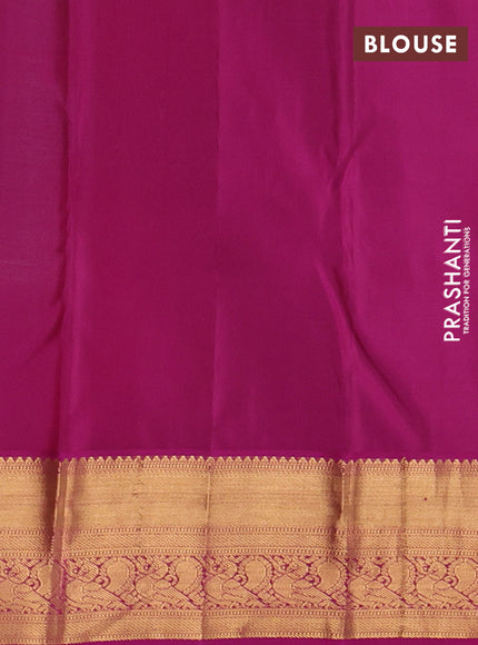 Pure kanchipuram silk saree teal blue and magenta pink with allover zari woven brocade weaves and rich zari woven korvai border