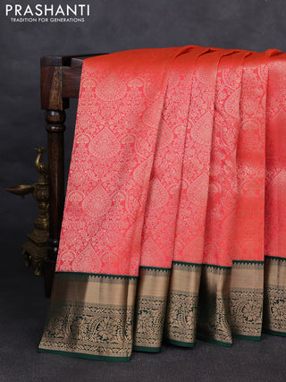 Pure kanchipuram silk saree peach orange and bottle green with allover zari woven brocade weaves and rich zari woven korvai border