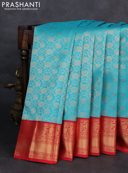 Pure kanchipuram silk saree teal blue and red with allover zari woven brocade weaves and rich zari woven korvai border