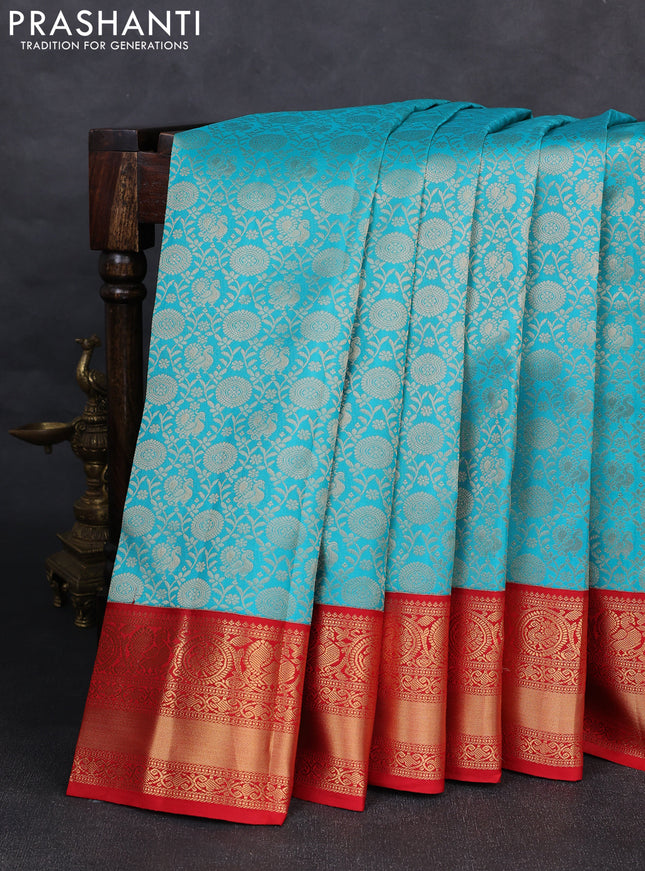 Pure kanchipuram silk saree teal blue and red with allover zari woven brocade weaves and rich zari woven korvai border