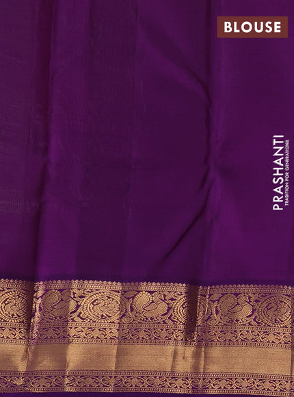Pure kanchipuram silk saree pista green and purple with allover zari woven brocade weaves and rich zari woven korvai border