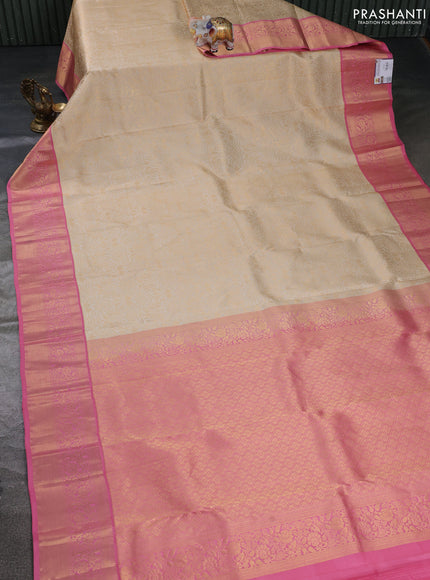 Pure kanchipuram silk saree cream and light pink with allover zari woven brocade weaves and rich zari woven korvai border