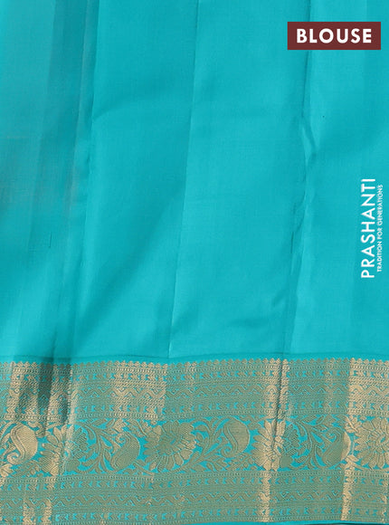 Pure kanchipuram silk saree peach pink and teal blue with allover zari woven brocade weaves and rich zari woven korvai border