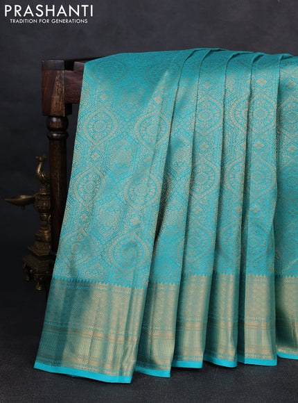 Pure kanchipuram silk saree teal blue with allover zari woven brocade weaves and rich zari woven border