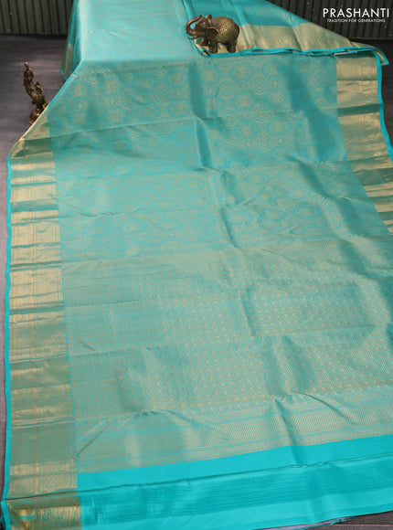 Pure kanchipuram silk saree teal blue with allover zari woven brocade weaves and rich zari woven border