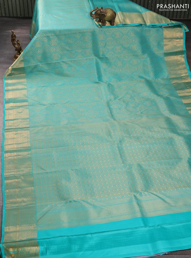 Pure kanchipuram silk saree teal blue with allover zari woven brocade weaves and rich zari woven border