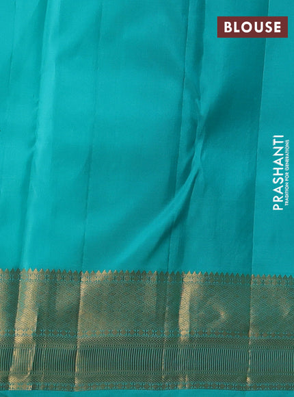 Pure kanchipuram silk saree teal blue with allover zari woven brocade weaves and rich zari woven border