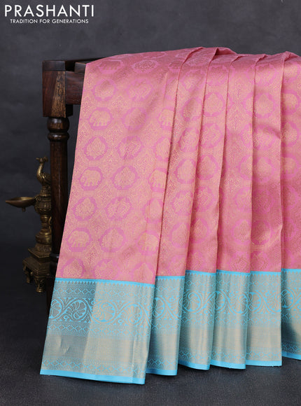 Pure kanchipuram silk saree light pink and light blue with allover zari woven brocade weaves and rich zari woven korvai border