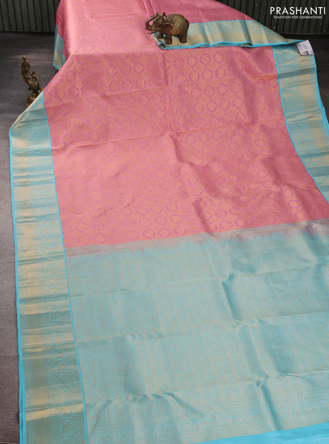 Pure kanchipuram silk saree light pink and light blue with allover zari woven brocade weaves and rich zari woven korvai border