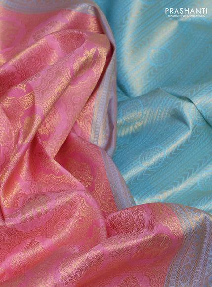 Pure kanchipuram silk saree light pink and light blue with allover zari woven brocade weaves and rich zari woven korvai border