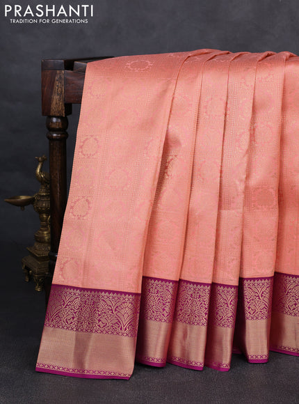 Pure kanchipuram silk saree peach and purple with allover zari woven brocade weaves and rich zari woven korvai border