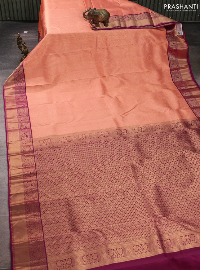 Pure kanchipuram silk saree peach and purple with allover zari woven brocade weaves and rich zari woven korvai border