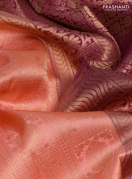 Pure kanchipuram silk saree peach and purple with allover zari woven brocade weaves and rich zari woven korvai border