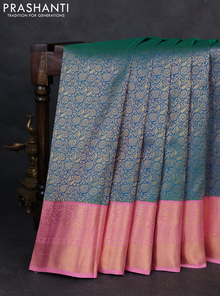Pure kanchipuram silk saree dual shade of teal green and light pink with allover zari woven brocade weaves and rich zari woven korvai border