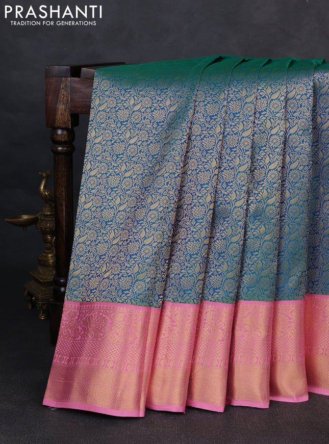 Pure kanchipuram silk saree dual shade of teal green and light pink with allover zari woven brocade weaves and rich zari woven korvai border