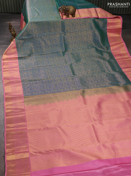 Pure kanchipuram silk saree dual shade of teal green and light pink with allover zari woven brocade weaves and rich zari woven korvai border