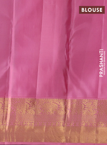 Pure kanchipuram silk saree dual shade of teal green and light pink with allover zari woven brocade weaves and rich zari woven korvai border