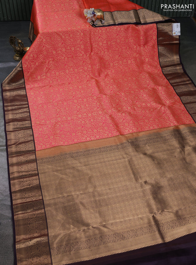 Pure kanchipuram silk saree peach orange and jamun shade with allover zari woven brocade weaves and rich zari woven korvai border