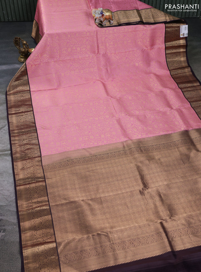 Pure kanchipuram silk saree light pink and jamun shade with allover zari woven brocade weaves and rich zari woven korvai border