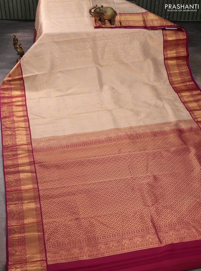 Pure kanchipuram silk saree beige and purple with allover zari woven brocade weaves and rich zari woven korvai border