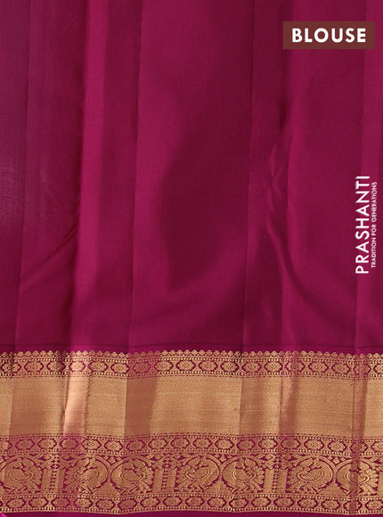 Pure kanchipuram silk saree teal blue and purple with allover zari woven brocade weaves and rich zari woven korvai border