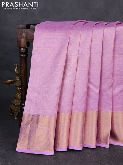 Pure kanchipuram silk saree lavender with allover zari woven brocade weaves and rich zari woven border